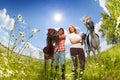 Portrait of young couple with purebred horses Royalty Free Stock Photo