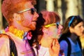 Portrait of young couple taking part in The Color Run in Trieste