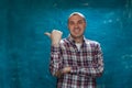 Cute man posing on blue background Royalty Free Stock Photo