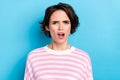 Portrait of young disappointed lady staring no believe impossible news grumpy face isolated on blue color background Royalty Free Stock Photo