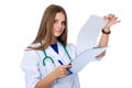 Portrait of a young doctor checking reports Royalty Free Stock Photo