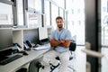 Portrait of young doctor working in his office. Royalty Free Stock Photo