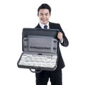 Portrait the Young executive man holding a baggage with banknote Royalty Free Stock Photo