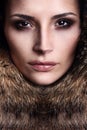 Portrait of a young fashion model wearing fur