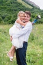 Portrait of a young father with his daughter in his arms Royalty Free Stock Photo