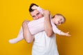 Portrait of young father hugging his baby daughter Royalty Free Stock Photo