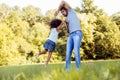 Portrait of young father playing with his daughter Royalty Free Stock Photo