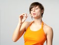 Portrait of a young female blowing soap bubbles Royalty Free Stock Photo