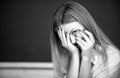 Portrait of young female college shame embarrassed student classroom on class with blackboard background. Royalty Free Stock Photo