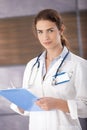 Portrait of young female doctor in modern hospital Royalty Free Stock Photo