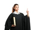 Portrait of a young female judge holding law books Royalty Free Stock Photo