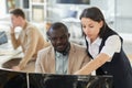 Young female manager instructing employee Royalty Free Stock Photo