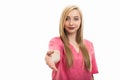 Portrait of young female nurse wearing scrubs offering hand shake Royalty Free Stock Photo