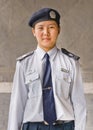 Portrait of young female police officer, Beijing, China