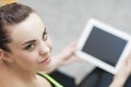 Portrait of Young Female Woman Holding Tablet Personal Computer. Royalty Free Stock Photo