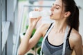 Portrait young fitness woman eating yogurt at home Royalty Free Stock Photo
