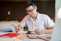 Portrait of a young and fresh asian boy in the campus Royalty Free Stock Photo