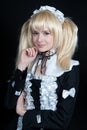 Portrait of young girl in anime lolita suit