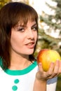 Portrait young girl with apple Royalty Free Stock Photo