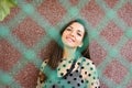 Portrait of a young girl behind a green net Royalty Free Stock Photo