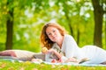 Portrait of young girl with books and apple Royalty Free Stock Photo