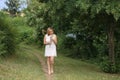 Portrait of a young girl collecting flowers Royalty Free Stock Photo