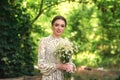 Portrait of a young girl in daisies Royalty Free Stock Photo