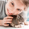 Portrait of young girl with degu squirrel Royalty Free Stock Photo