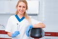 Portrait of a young girl dentist in the office. Dentist at the workplace