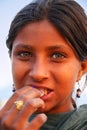 Portrait of a young girl eating