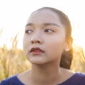 Portrait young girl at field gass Royalty Free Stock Photo