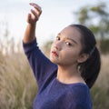 Portrait young girl at field gass Royalty Free Stock Photo