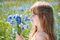 Portrait of young girl with flowers Royalty Free Stock Photo