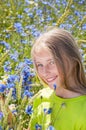 Portrait of young girl with flowers Royalty Free Stock Photo