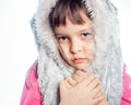 Portrait of young girl with furry hood