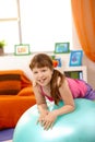 Portrait of young girl with gym ball Royalty Free Stock Photo