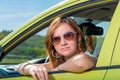 Portrait of a young girl in his car Royalty Free Stock Photo