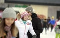 The girl on the ice rink.