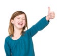 Portrait of a young girl laughing with thumbs up Royalty Free Stock Photo