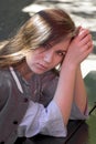 Portrait of a young girl with long hair, the girl in the shirt i