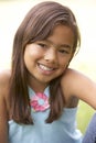 Portrait Of Young Girl In Park Royalty Free Stock Photo