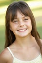 Portrait Of Young Girl In Park Royalty Free Stock Photo