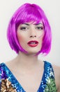 Portrait of a young girl in a pink wig Royalty Free Stock Photo