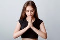 Portrait of a young girl praying Royalty Free Stock Photo