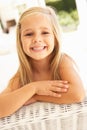 Portrait Of Young Girl Relaxing On Sofa Royalty Free Stock Photo