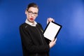 Portrait of a young girl with the tablet Royalty Free Stock Photo