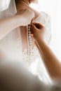 Portrait of young gorgeous bride on the balcony