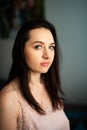 Portrait of a young gorgeous brunette in sexy gown. Focus on her face Royalty Free Stock Photo