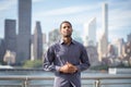 Portrait of young handsome African American man with NYC skyline Royalty Free Stock Photo