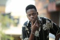 Portrait of young handsome afro black man posing outdoor Royalty Free Stock Photo